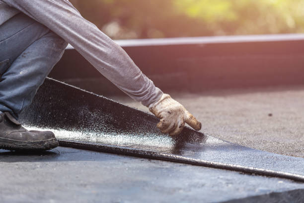 Professional Emergency Waterproofing technician working in Henderson, MI